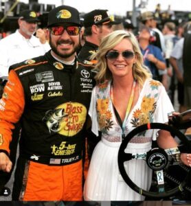 Pollex posing with her boyfriend NASCAR champion Martin Truex Jr.