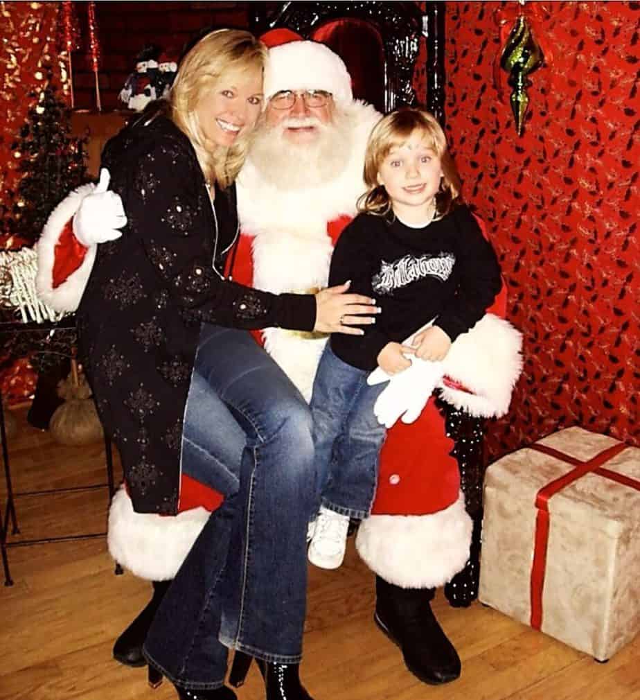 Kari Michaelsen celebrating Christmas with her son and santa.