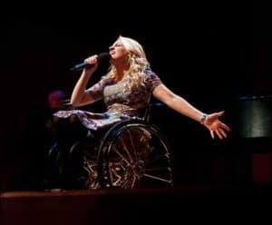 Ali-stroker-performing-on-stage