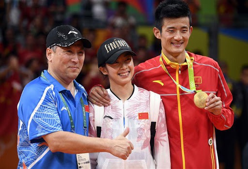 Chen together with his wife and coach