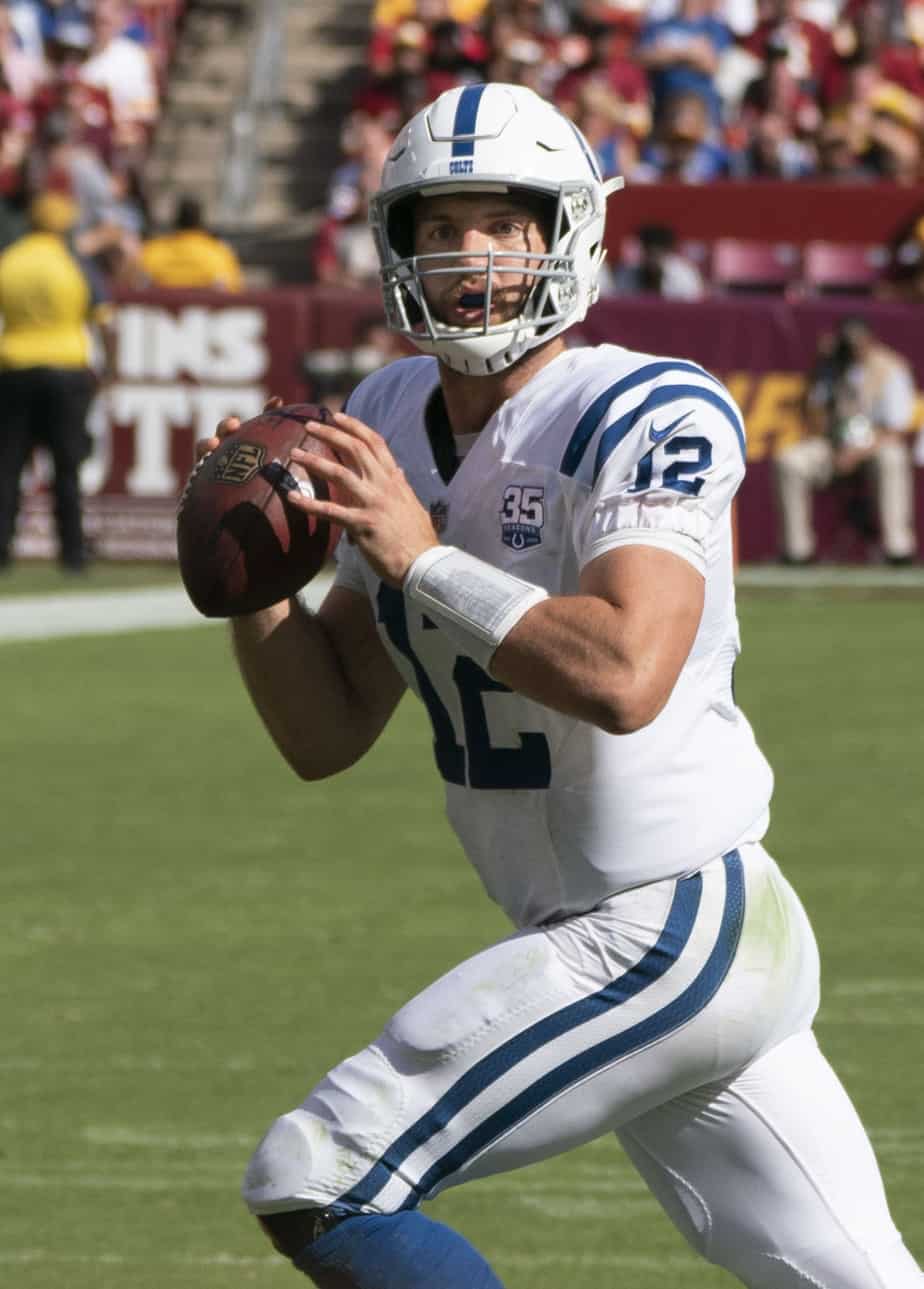 Andrew Luck playing football.