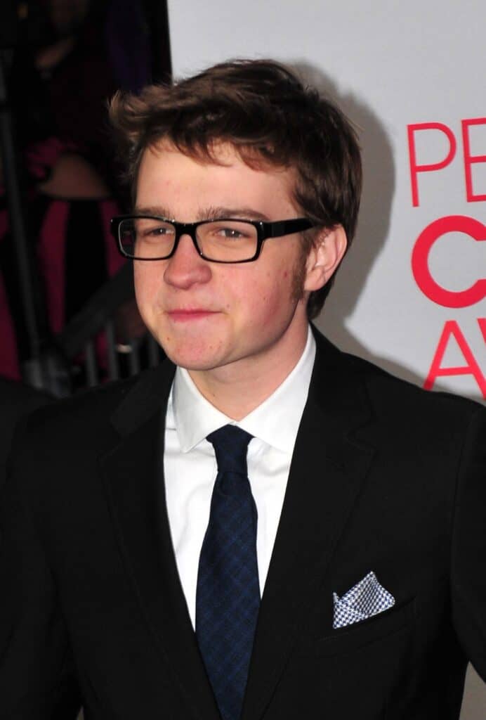 Angus T. Jones posing for an event