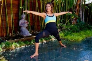Arianna Huffington posing for yoga
