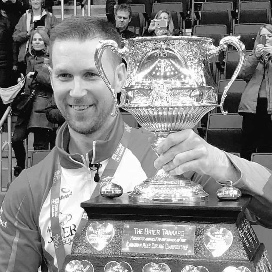 brad gushue with his trophy