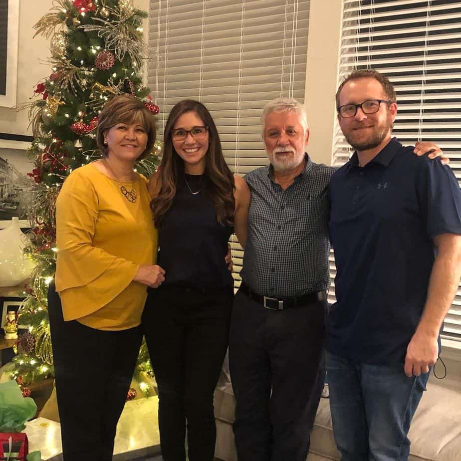 clara with her husband and parents