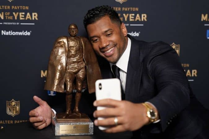 Russell Wilson with his Trophy