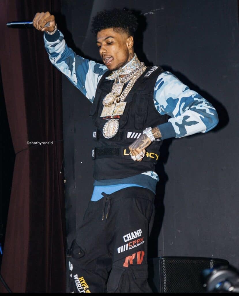 Blueface reacts during a live performance