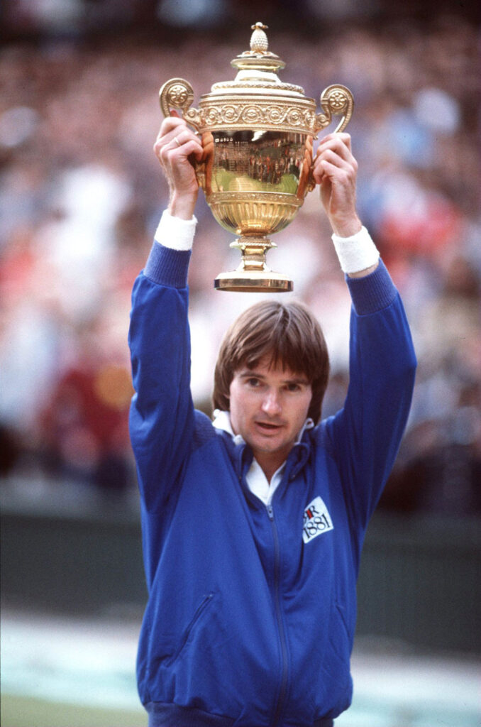Jimmy-Connors-holding-1982-Wimbledon-trophy