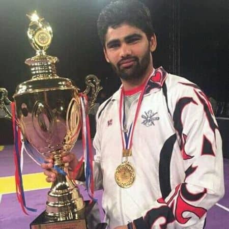 Pardeep Narwal holding Trophy