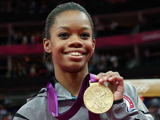 Gabby-Douglas-posing-with-her-medal