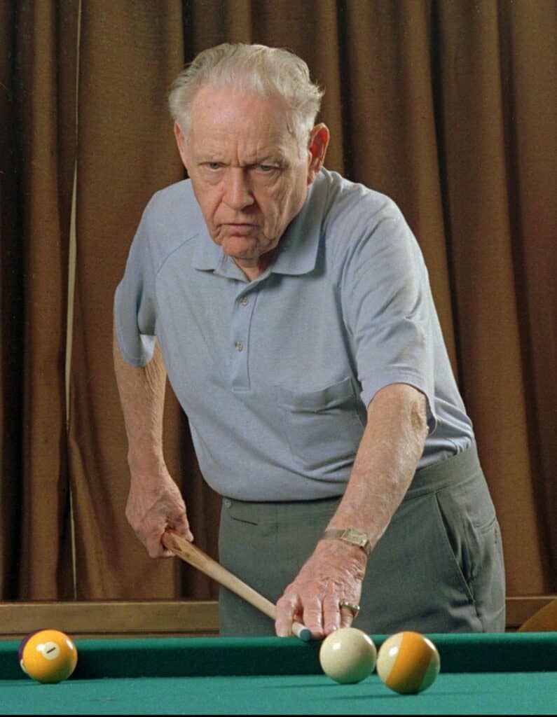 Rudolf Wanderone, later in his life, playing a game of pool