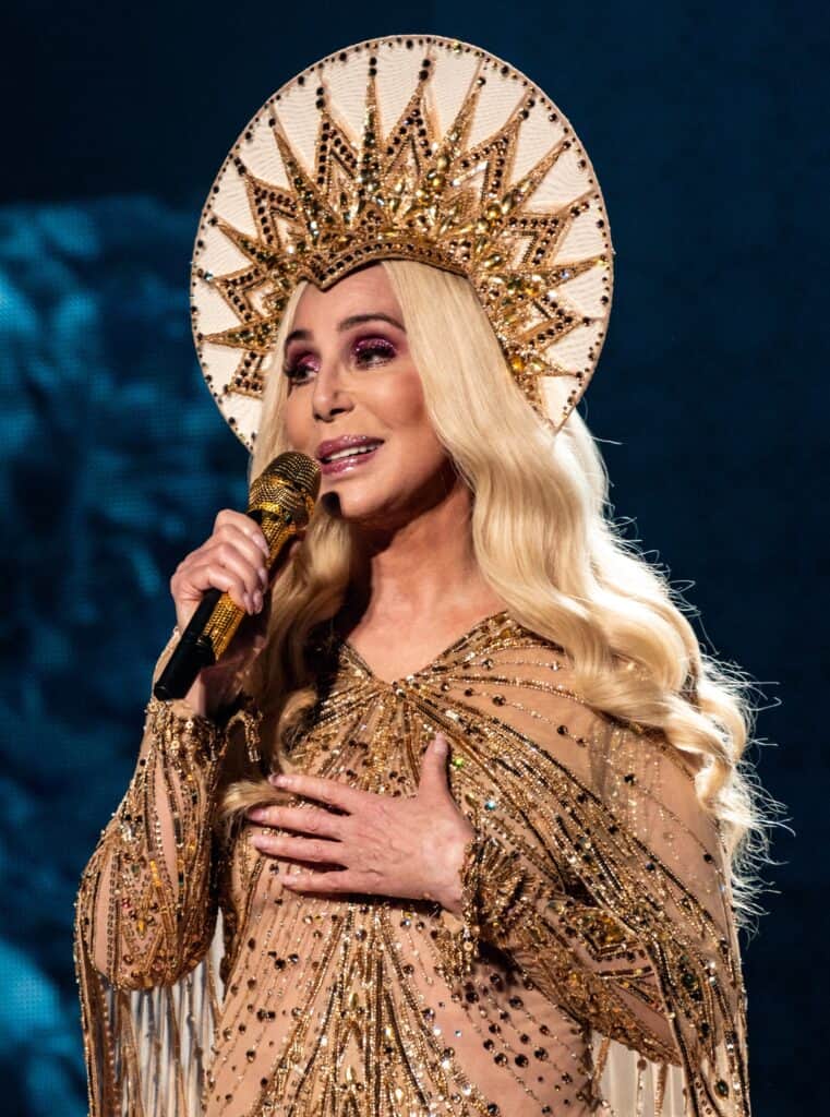 Cher is performing with a crown.
