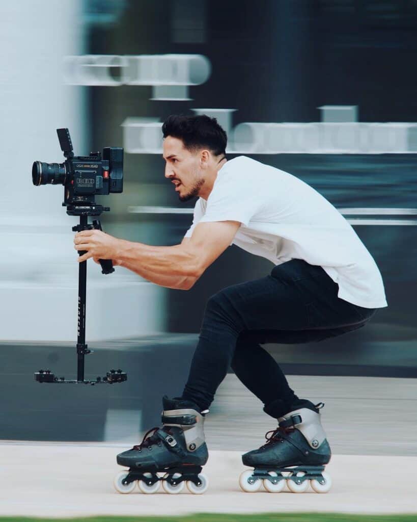 Daniel Ilabaca filming while roller skating