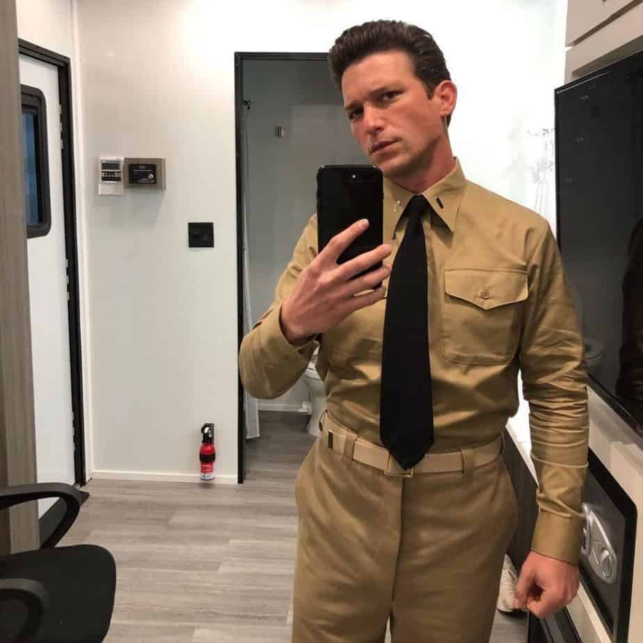 Daren-Kagasoff-taking-a-mirror-selfie-in-his-Devotion-costume