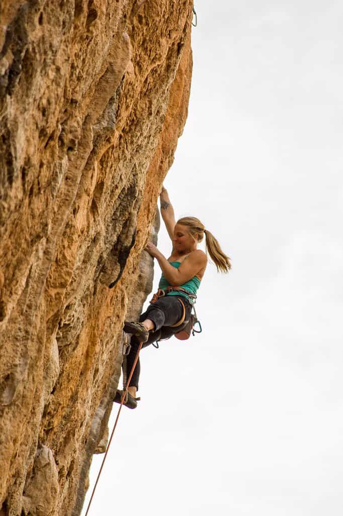 Emily Harrington climbing a rock