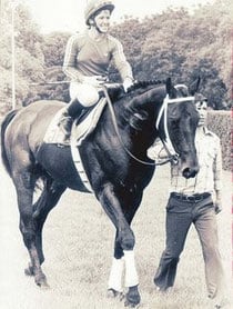 Marina Lezcano posing with her horse