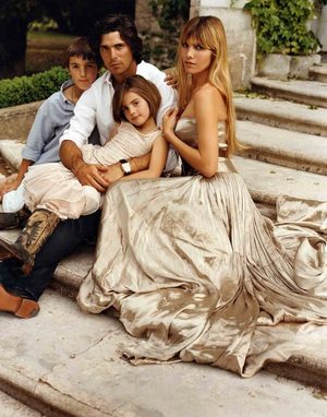 Nacho Figueras posing for a photo with his family