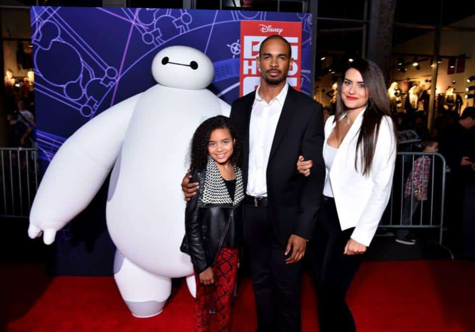 The Wayans family, with the movie character Baymax.