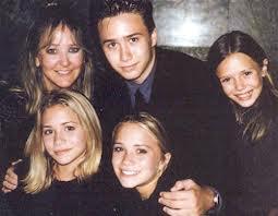 Trent Olsen with his mother and sisters