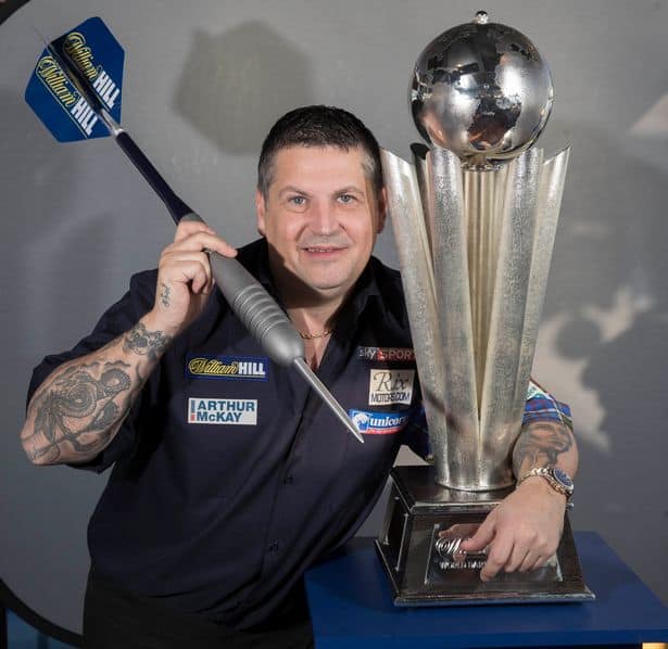 Gary posing with World Darts Championship trophy