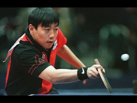 Liu Guoliang playing table tennis.