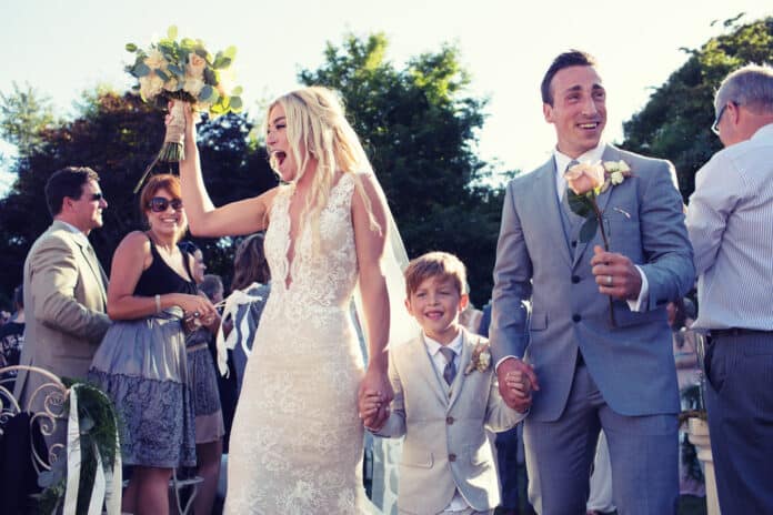 Brad Marchand, along with his wife Katrina Sloane and son Sloan during their wedding in 2015