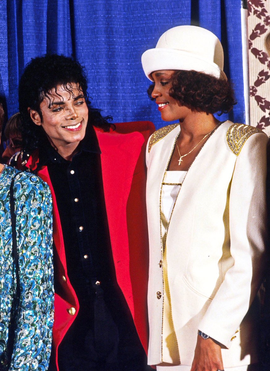 Michael Jackson pictured alongside Whitney Houston.
