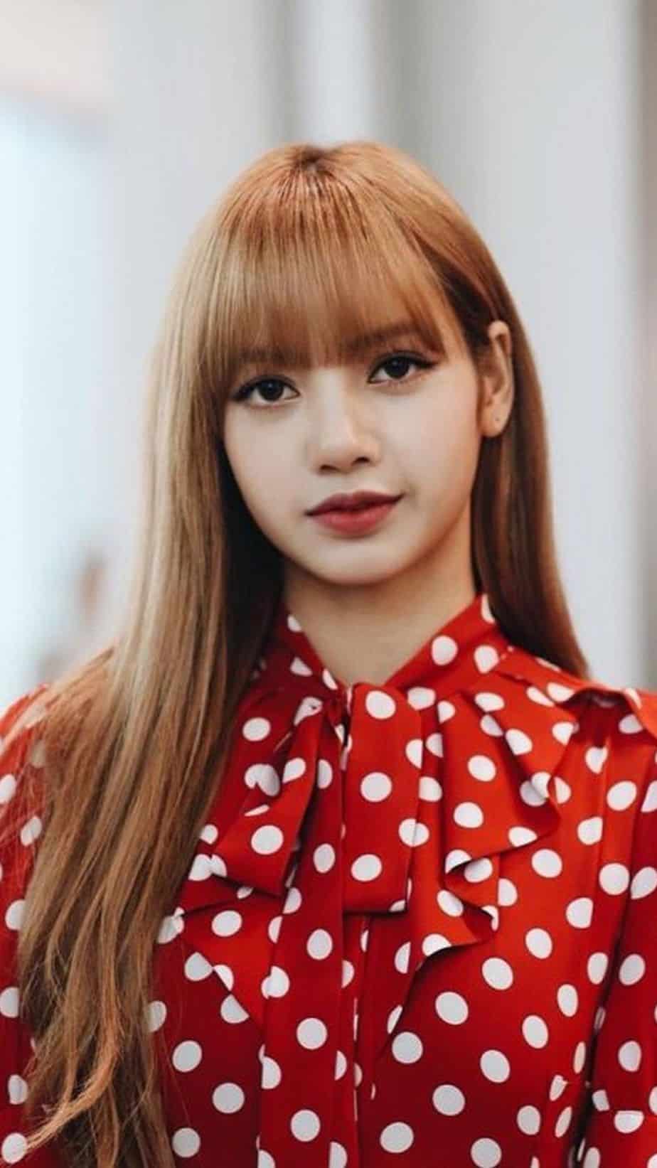 Lisa in a red and white dress