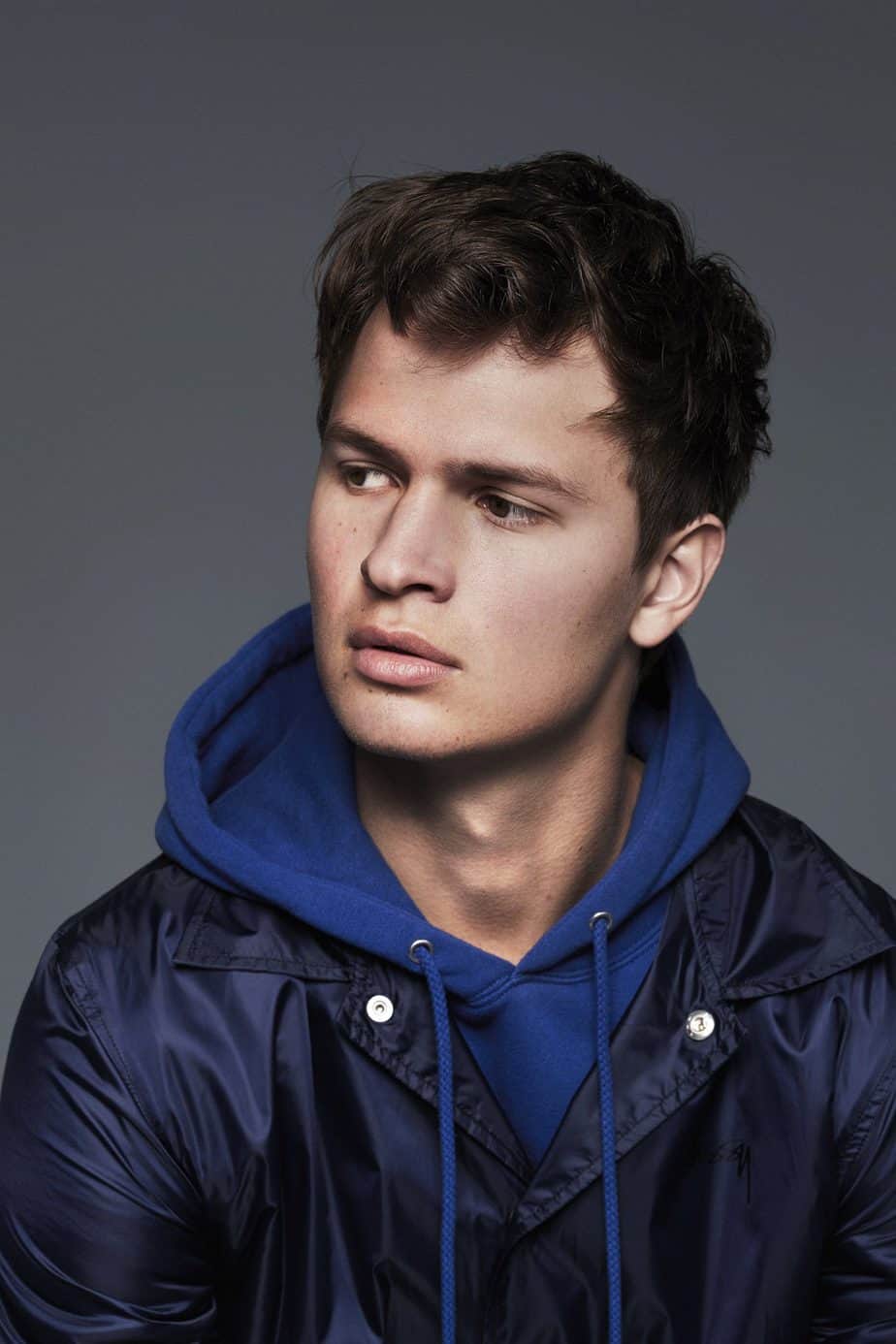 Ansel posing for a photoshoot.