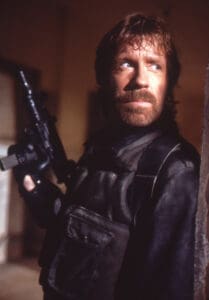 Chuck Norris performing in The Delta Force