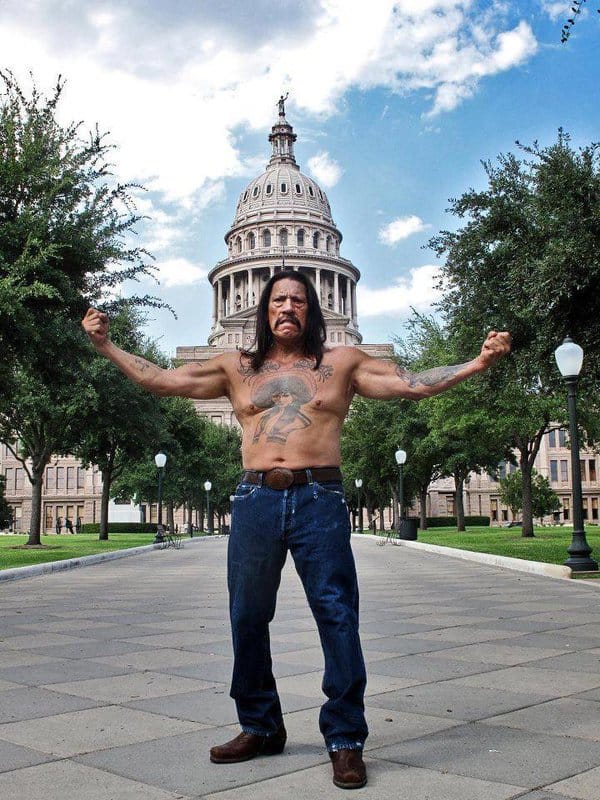 Danny Trejo is posing in an angry look