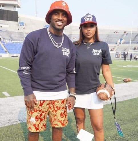 Deiondra Sanders posing for a photo with her father (source celebslifereel.com)