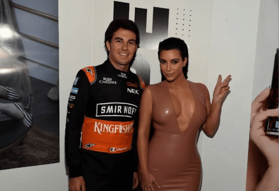 Sergio is pictured alongside Kim Kardashian during an 2015 F1 Event (Source: Essentially Sports)
