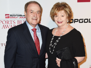 Al Michaels and his wife Linda Anne Stamaton pose for photo as they arrive at the Sports Business Awards 1