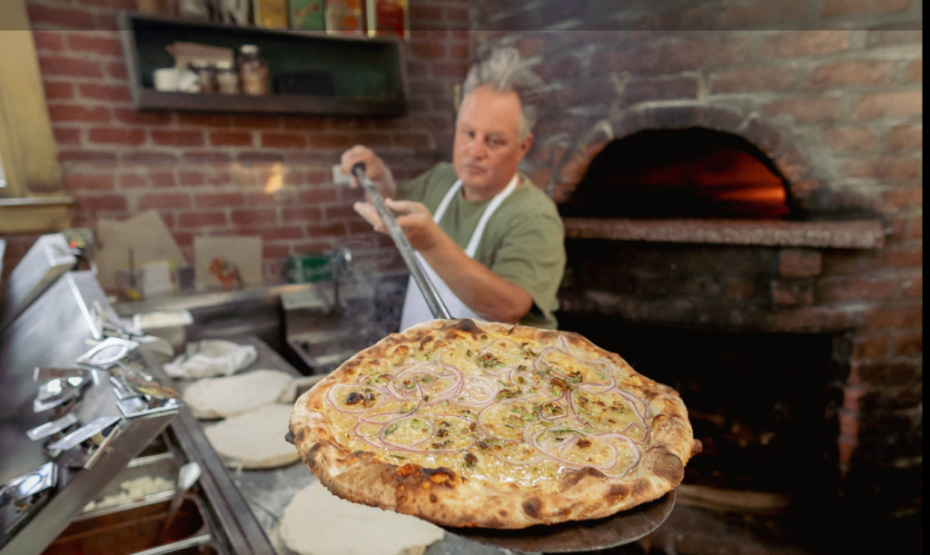 Chris Bianco presents a pizza fresh from the oven
