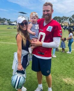 Cooper Rush with his wife and daughter