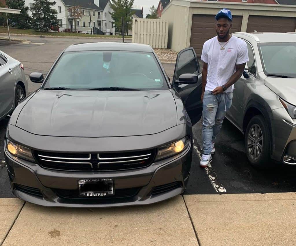 Hassan Haskins with his new car.