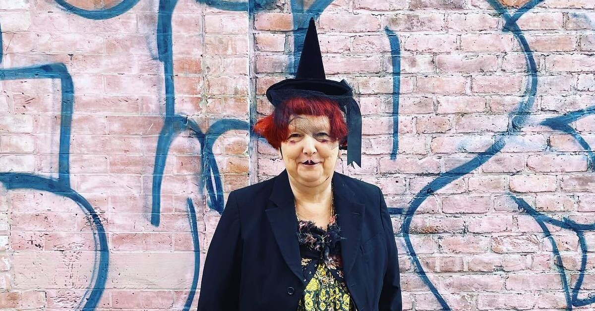 Lynn Yaeger with a witch hat