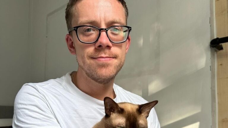 Owen Jones with his cat